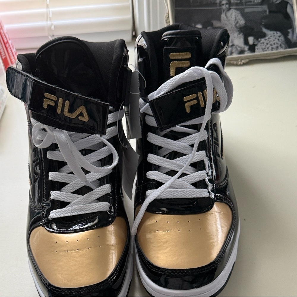 FILA Black Sneakers with Gold Logo Accent